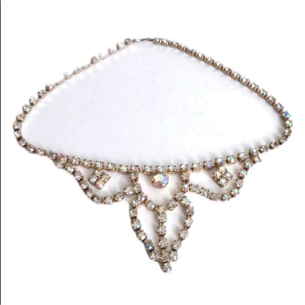 Vintage iridescent crystal necklace and clip earrings.